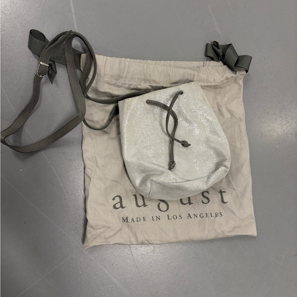 AUGUST Metallic Silver Pouch Bag